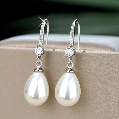 Dangling Earrings with Bright Pearls | White Gold